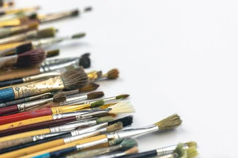 Close-up, brushes for drawing on a white background. Stock Photos
