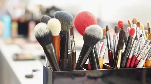 Close up of brushes, makeup tools on the table in the dressing room Video stock 103235112