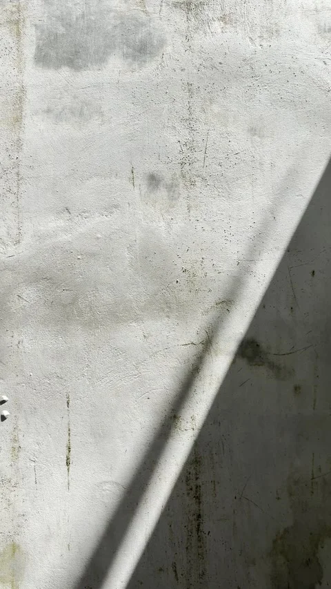Close Up Brutalist Concrete Wall Texture with Moving Diagonal Shadow Background Video stock 332543210