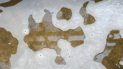 Close - up of bubble flowing after car wash. Stock Footage 72845098