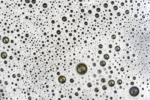 Close-up of bubble foam with varying sizes creating a textured pattern, suitable Stock Photos