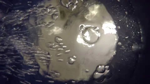 Close up of bubble water in blue bucket. 4K Stock Footage 50526528