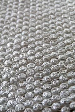 Close up of bubble wrap foil texture with selective focus for background Stock Photos