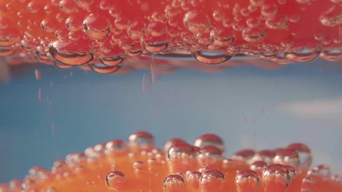 Close-Up of Bubbles Between Two Tomato Slices Video stock 330941913