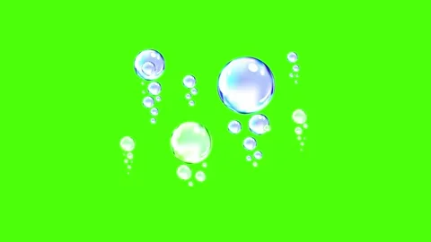 Close-up of bubbles floating against a green screen background Stock Footage 341779635