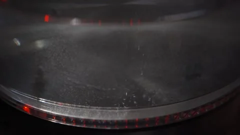 Close up of bubbles forming at the bottom of an electric kettle Stock Footage 257770866