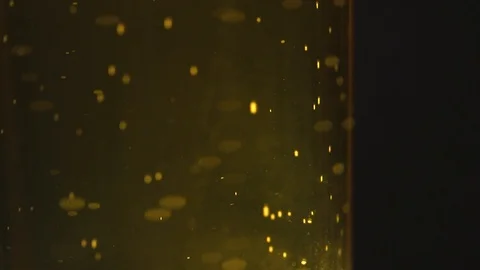 Close-up Of Bubbles In A Glass Of Beer Stock Footage 127023924