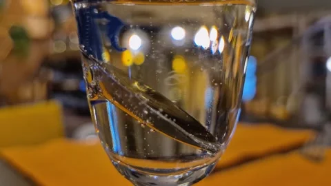Close-up of bubbles in a glass filled with sparkling wine Stock-Footage 319114977
