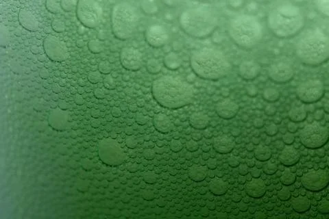 Close-up of bubbles in a green liquid, possibly a beverage or a chemical solu Stock Photos