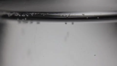 Close up of bubbles in a soda drink Video stock 296123472
