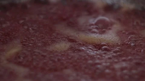 Close up Bubbles of Strawberry Jam (Slow Motion) Stock Footage 233471732
