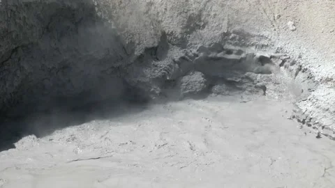 Close up of bubbling mud volcano at Yellowstone National Park Stock Footage