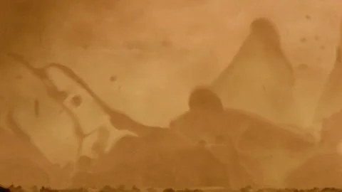 Close-up of a bubbling pool and river of molten steel Stock Footage 312273598