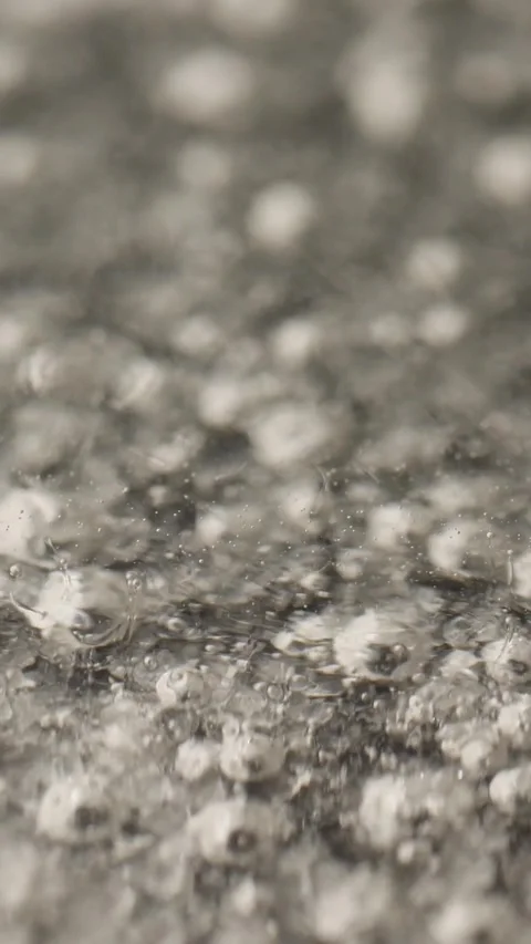Close-up of bubbling thick liquid, showcasing texture and movement. Abstract Stock Footage 300311467