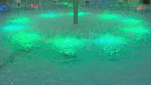 Close-up of bubbling water in a fountain with a backlight. Видео 259634852