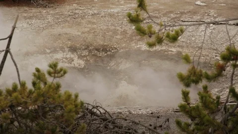 Close Up Bubbling Water in Geothermal Feature at Yellowstone National Park Stock Footage 86037039