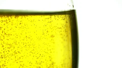 Close up buble beer in glass on white Video stock 97390341