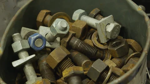 Close up bucket of bolts Stock Footage 242606936