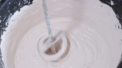 Close-up of a bucket of cement, mixing cement in a bucket. Stock-Footage 154382898