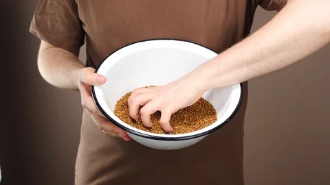 Close-up of buckwheat on a white background Stock Footage 129037409