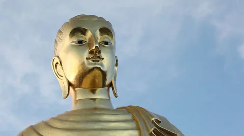 Close up of Buddha's Golden Statue - Low angle Stock Footage 38900784