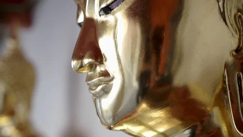 Close up of buddhist gold statue Stock Footage 75535506