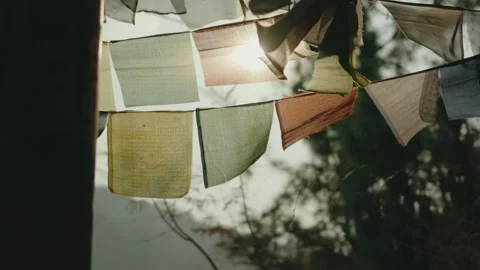 Close-Up of Buddhist Prayer Flags Backlit by Sunlight in Bhutan Stock Footage 342141939