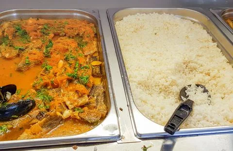 Close-up buffet with fish and pickled carrots and rice on the side Foto stock