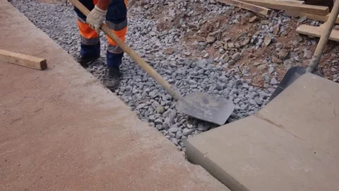 Close-up of builder with shovel. Stock Footage 230159830