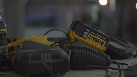 Close Up Of Builders Batteries Charging With Shallow Depth Of Field Stock Footage 92698053