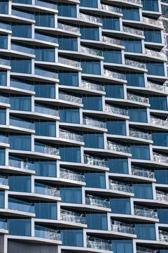 Close up building facade with repetitive pattern. architectural design Stock Photos