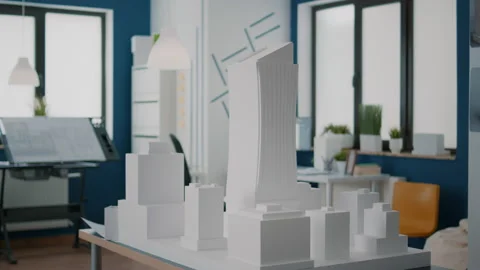 Close up of building model on table to design construction layout in Vídeos de archivo 166419910