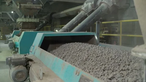 Close-up of bulk materials in a factory. Processing of raw additives in bulk at Stock Footage 231233937