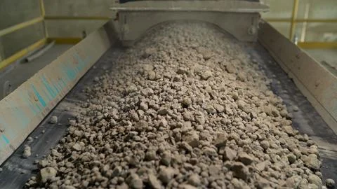 Close-up of bulk materials in a factory. Processing of raw additives in bulk at Stock Photos