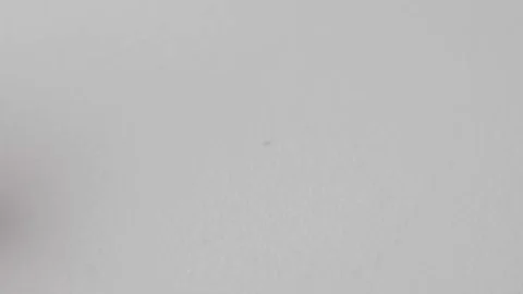 Close up of bulldog clips falling into frame Stock Footage 117349582