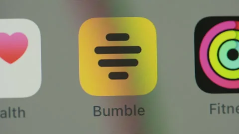 Close up of Bumble app on phone home screen 動画素材 280221810