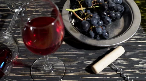 Close up bunch of Grapes , glass of red wine and bottle. Stock Footage 68837302