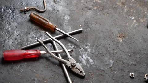 Close up of bunch of tools lying around in a garage, Bali Stock Footage 140293808
