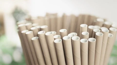 Close-up of a bundle of beige paper straws with selective focus Stock Footage 264061013