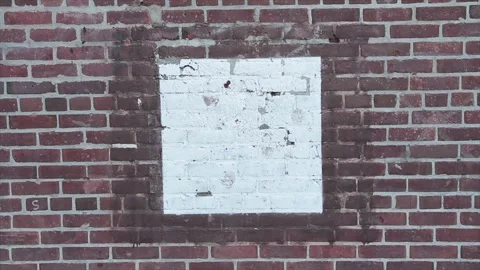 Close up of burby baseball square strike zone square on a brick wall Stock Footage 246137288