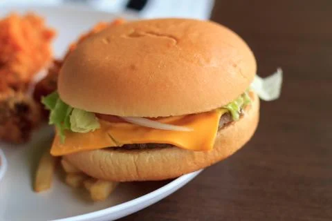 Close-up burger, burger select focus on a white plate, burger breakfast Stock Photos
