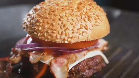 Close up: Burger is preparing a fire flame. Slow motion. Close up 스톡 동영상 111345382