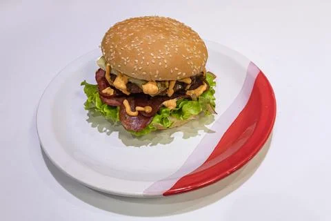 Close up of Burger on Table Top Foto stock