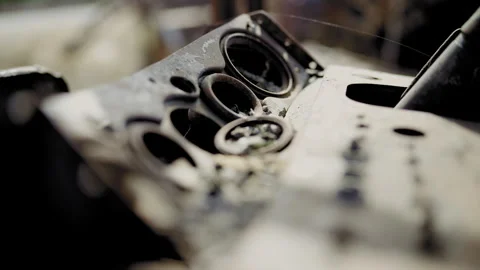 Close-Up of Burned Tractor Dashboard Rusting in Junkyard Stock Footage 305309667