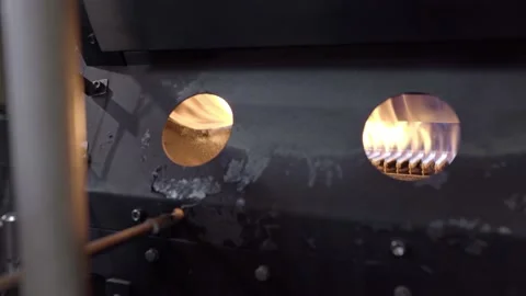 Close up of the burner of a coffee roaster machine Stock Footage 219592159