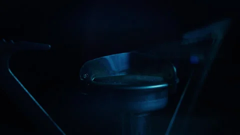 Close up of a Burner Lighting in the Dark Stock Footage 270400014
