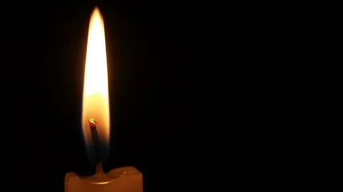 Close-up burning candle flame and extinguishing Stock Footage 93488136