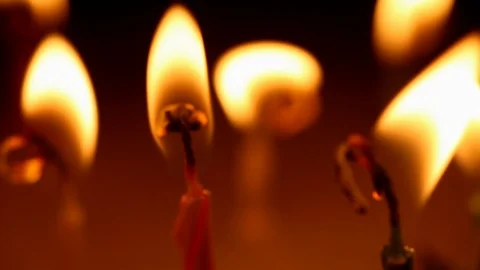 Close up of burning candles with dark background Stock Footage 111866489