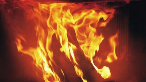 Close-up of burning fire flames in home fireplace background. Hot orange bonfire Stock Footage 146446936