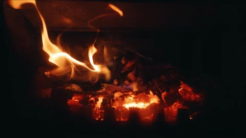 Close-up of Burning Firewood and Flickering Flames in a Fireplace (4x Slow Stock Footage 342380368